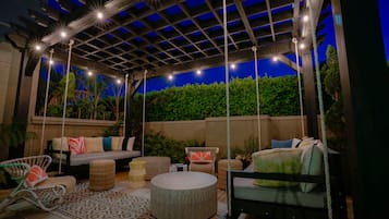 Outdoor pool, open 7:00 AM to 10:00 PM, pool umbrellas, pool loungers
