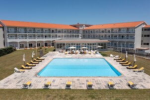 Indoor pool, seasonal outdoor pool, pool umbrellas, sun loungers