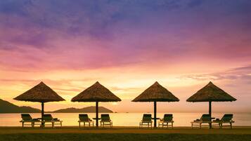 On the beach, free beach cabanas, beach volleyball, kayaking