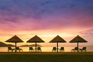 On the beach, free beach cabanas, beach volleyball, kayaking