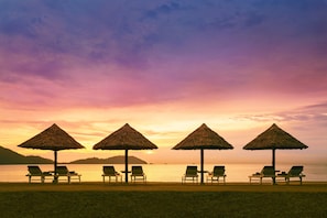 On the beach, free beach cabanas, beach volleyball, kayaking
