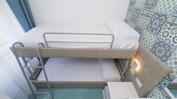 Family Room | 1 bedroom, minibar, desk, cribs/infant beds