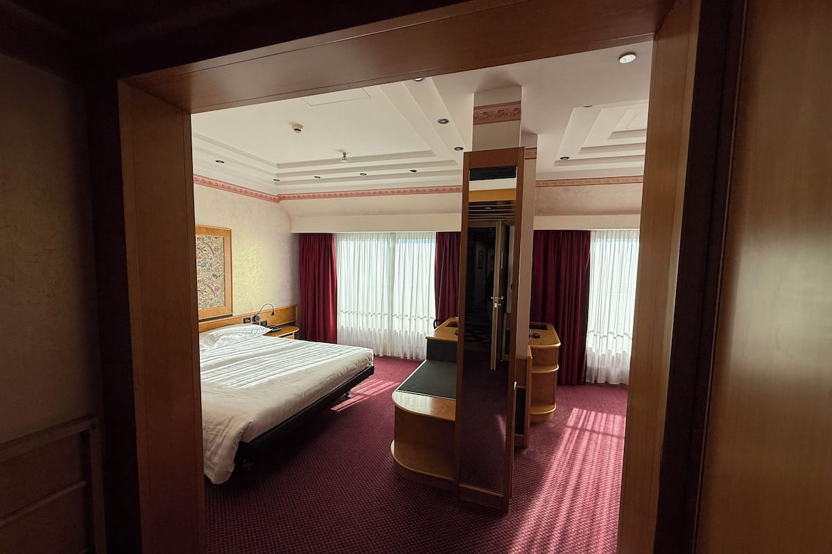 Kamar Triple Premium, 1 Tempat Tidur Double dengan tempat tidur Sofa | Seprai premium, selimut bulu angsa, minibar, dan brankas