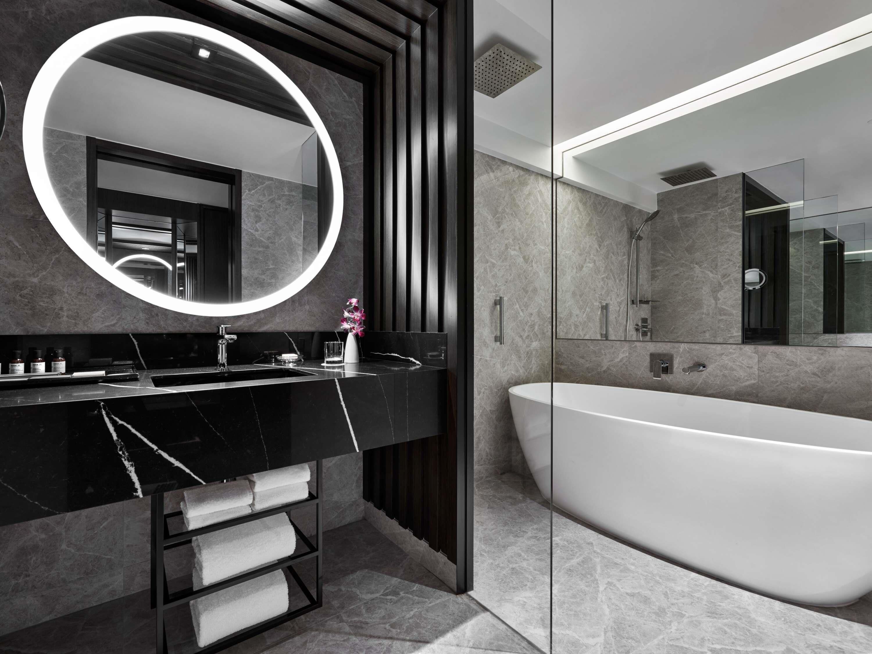Designer toiletries, hair dryer, bathrobes, slippers