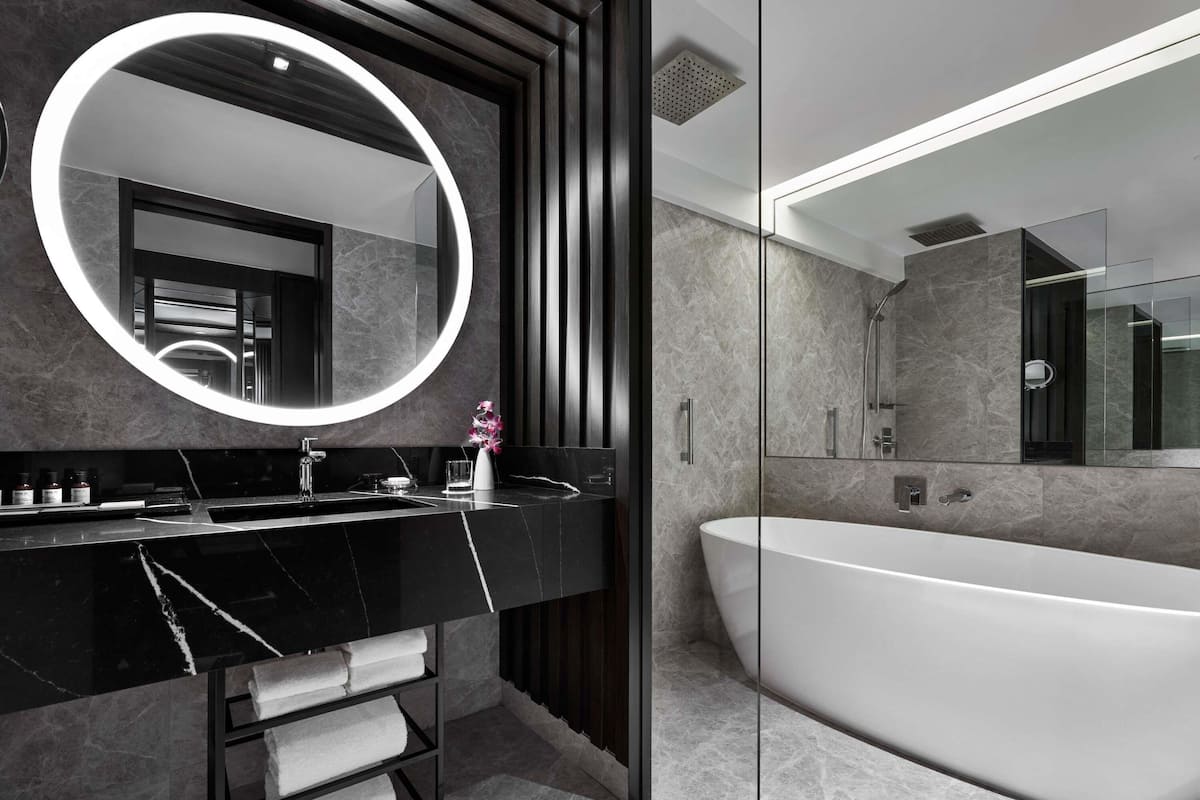 Designer toiletries, hair dryer, bathrobes, slippers
