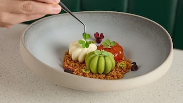A dessert on a plate with a fork.