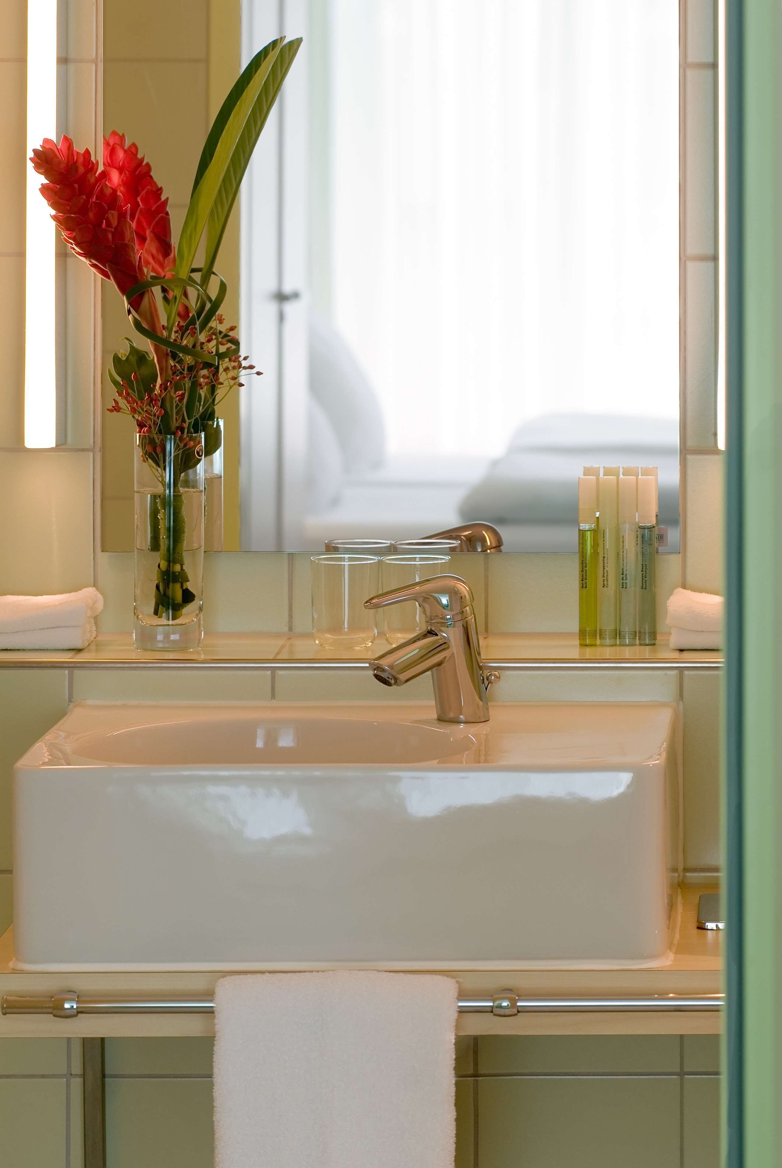 shower, eco-friendly toiletries, hair dryer, towels