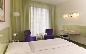 Hypo-allergenic bedding, in-room safe, desk, blackout drapes