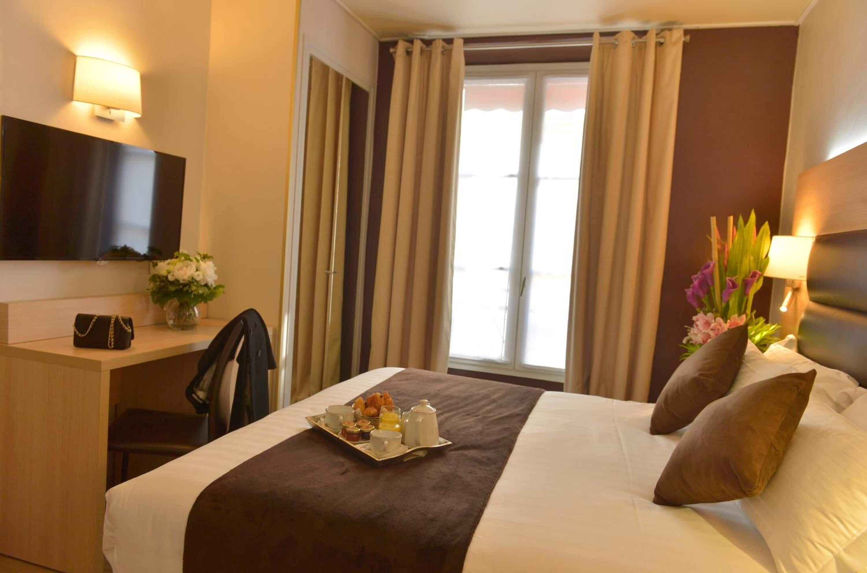 Foto - Hôtel Suites Unic Renoir Saint Germain