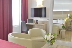 Luxe beddengoed, een minibar, een kluis op de kamer, geluiddichte muren