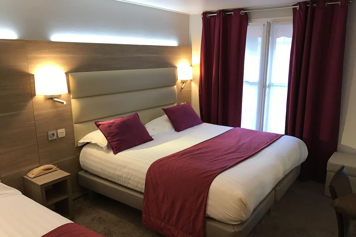 Luxe beddengoed, een minibar, een kluis op de kamer, geluiddichte muren