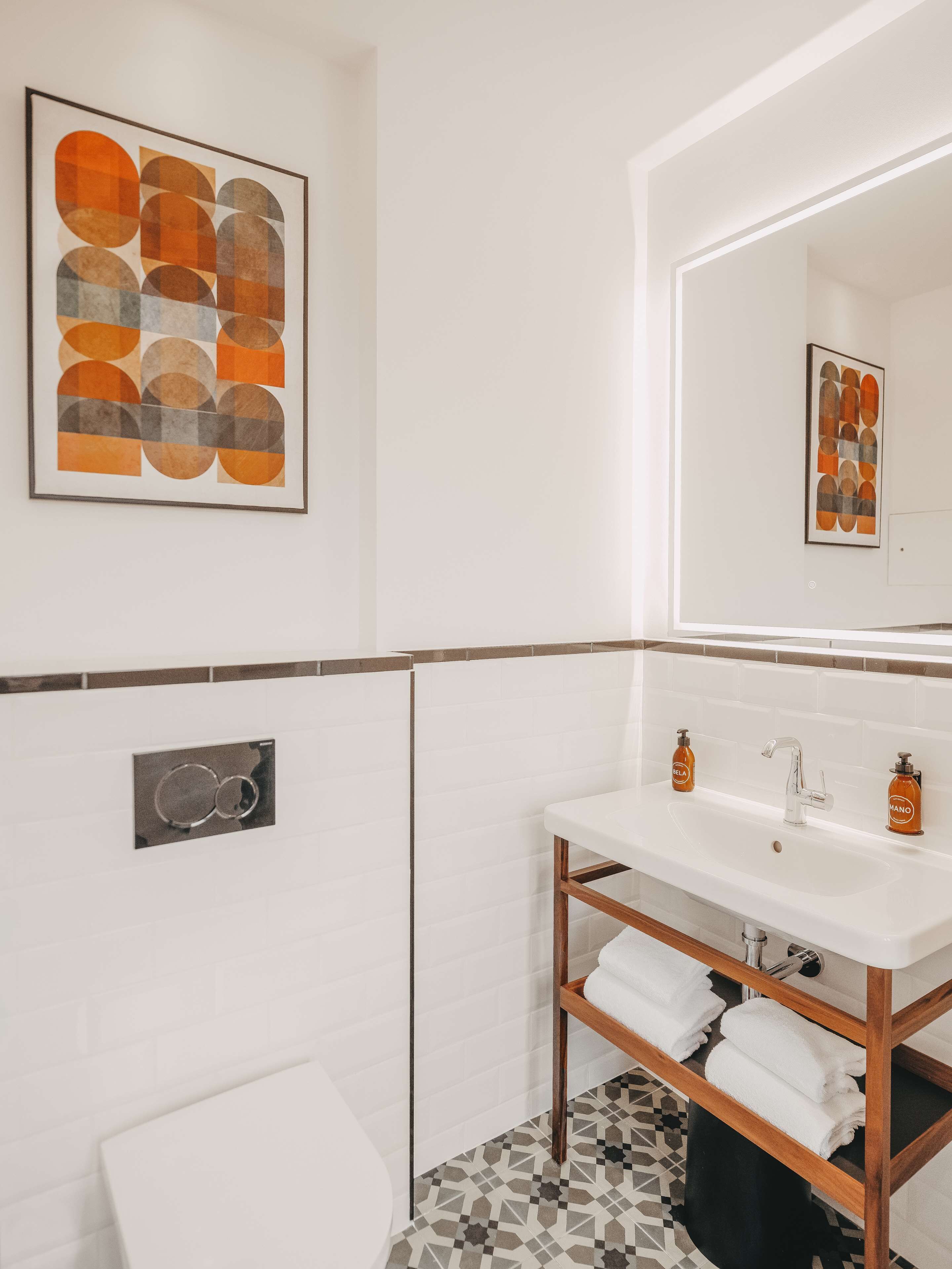 deluxe room, 1 king bed | bathroom | shower, free toiletries, hair dryer, bathrobes