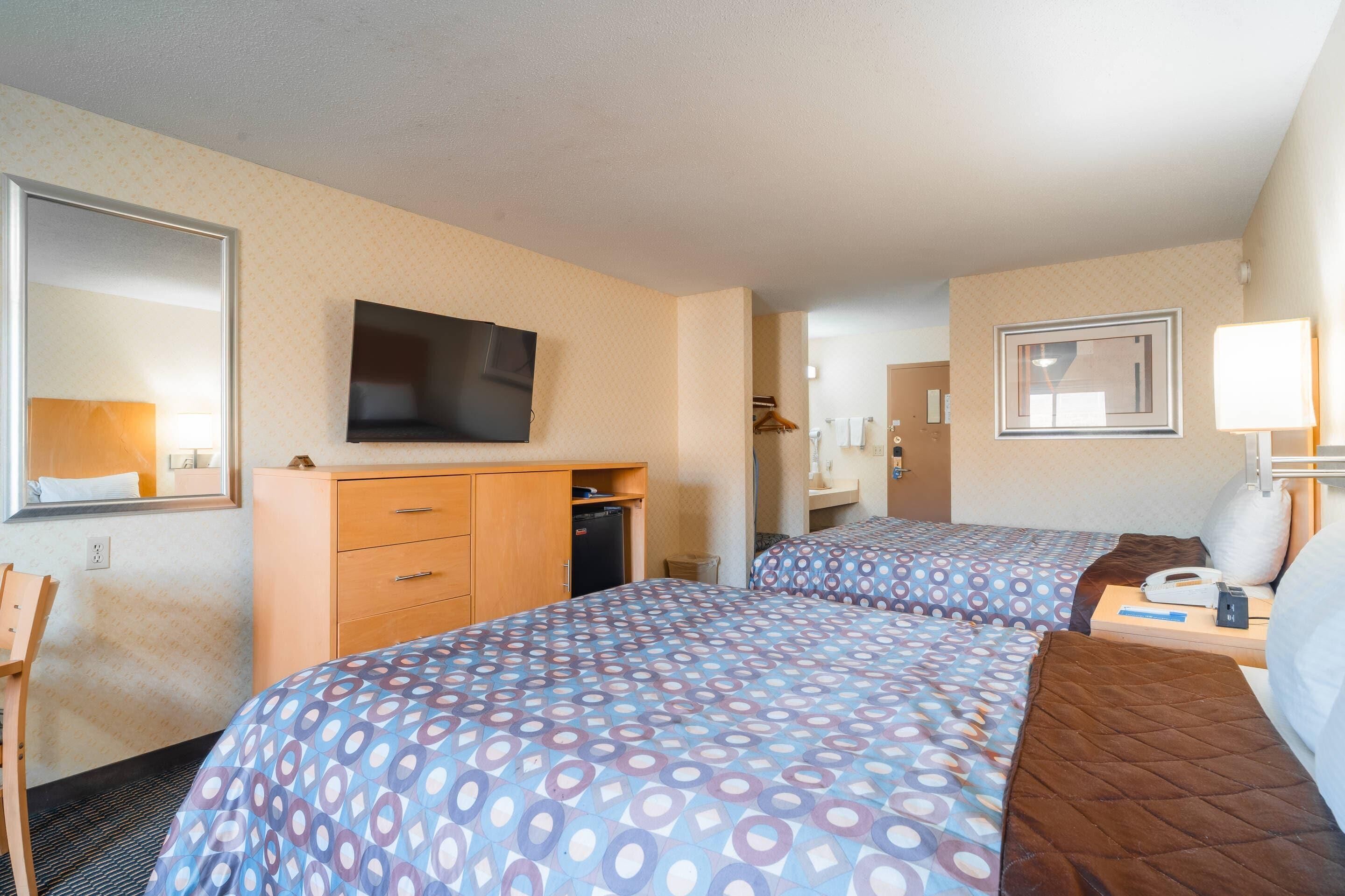 Standard Room, 2 Queen Beds, Non Smoking | Rollaway beds, free WiFi, bed sheets