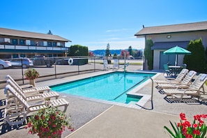 Seasonal outdoor pool, pool loungers