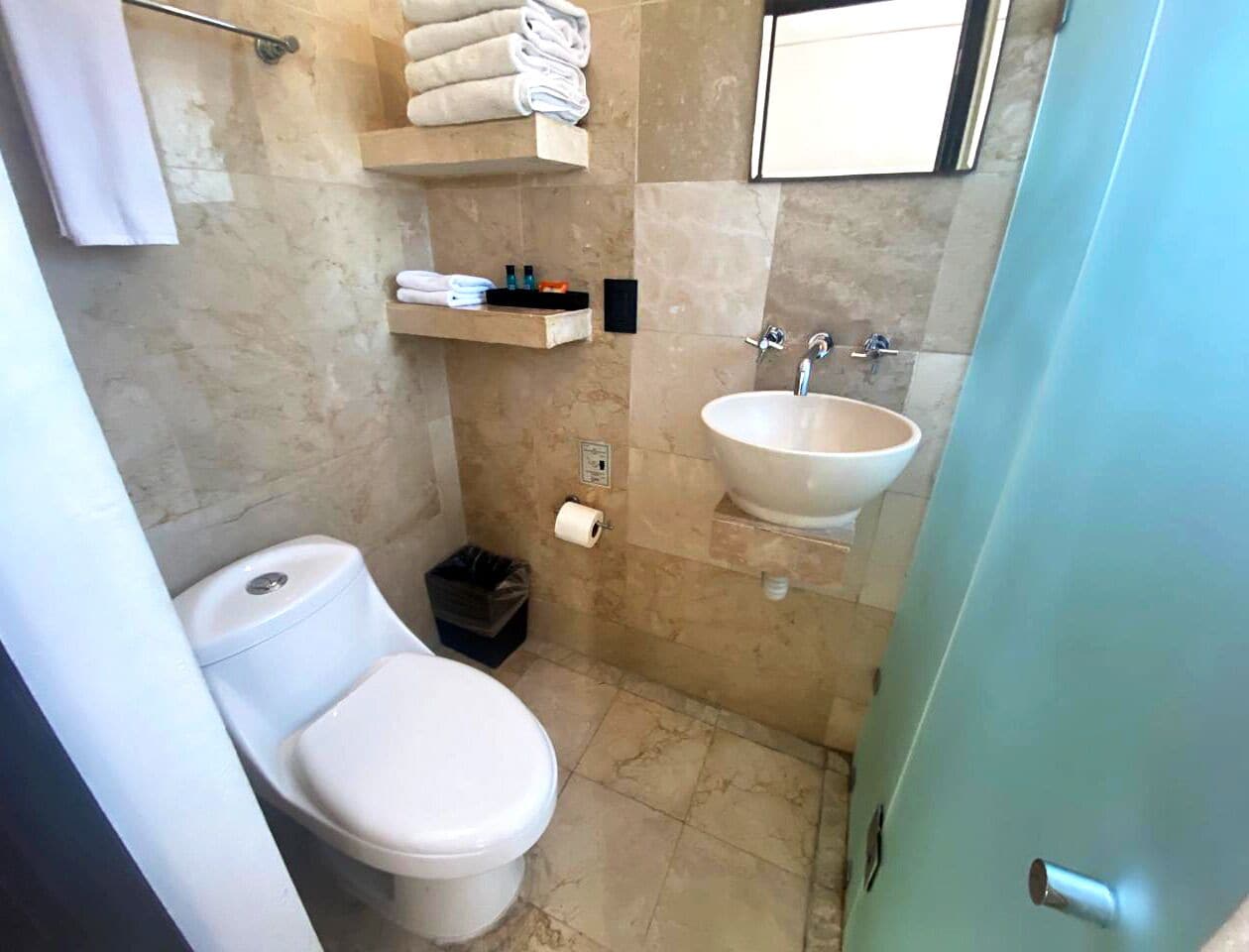 quadruple room, poolside | bathroom | shower, rainfall showerhead, free toiletries, hair dryer