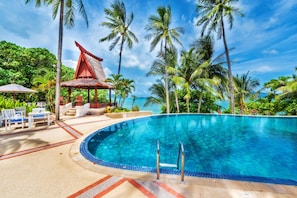 Indoor pool, outdoor pool, pool umbrellas, pool loungers - Panwa Boutique Beachfront (Wichit)