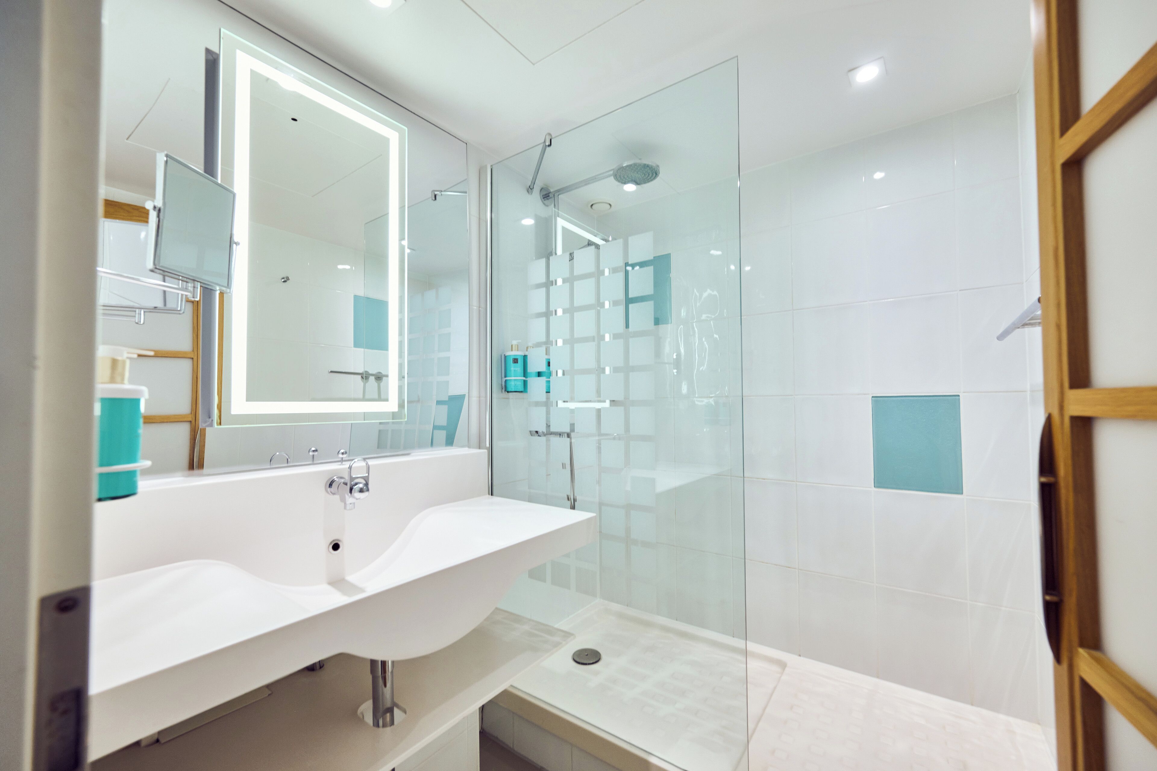 Shower, eco-friendly toiletries, hair dryer, towels