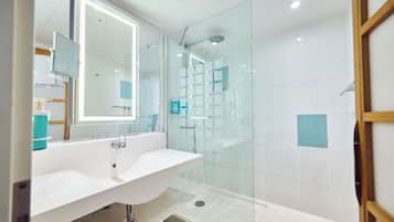 Shower, eco-friendly toiletries, hair dryer, towels