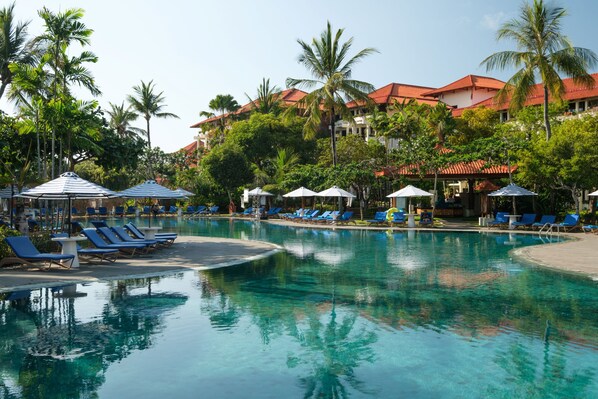 3 outdoor pools, open 7:00 AM to 9:00 PM, pool umbrellas, sun loungers