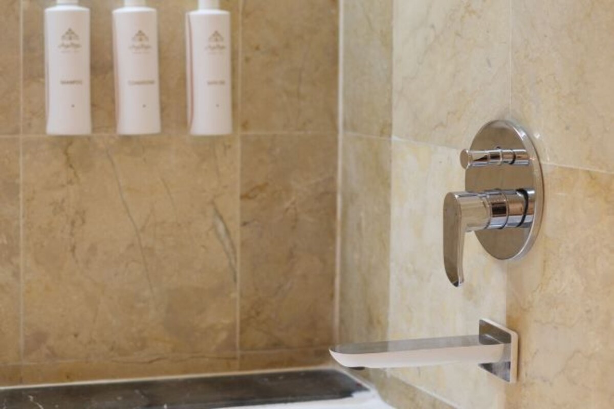 Bathroom | Designer toiletries, hair dryer, bathrobes, slippers