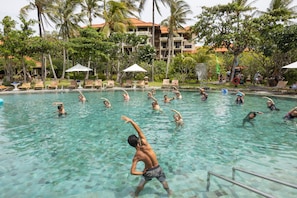 3 outdoor pools, open 7:00 AM to 9:00 PM, pool umbrellas, pool loungers
