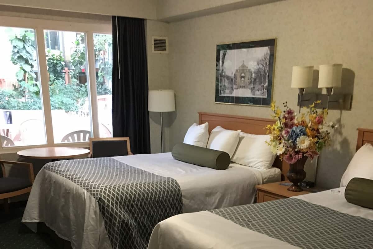 Premium bedding, desk, blackout drapes, iron/ironing board