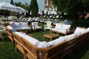 Seasonal outdoor pool, cabanas (surcharge), pool umbrellas