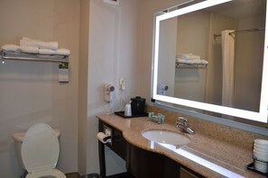 Suite, 2 Queen Beds, Smoking, Jetted Tub | Bathroom | Combined shower/tub, free toiletries, hair dryer, towels