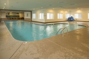 Indoor pool, outdoor pool, pool umbrellas, pool loungers