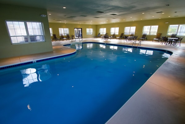 Indoor pool, outdoor pool, pool umbrellas, pool loungers