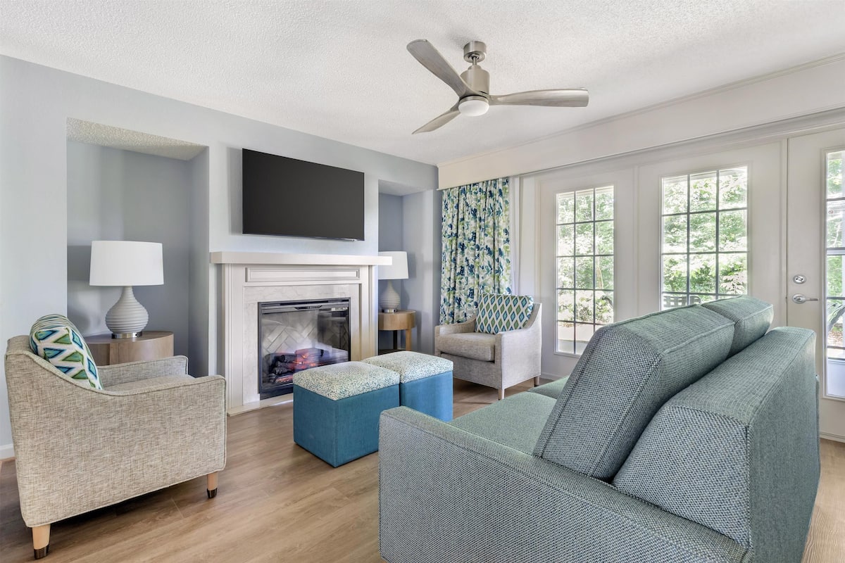 32-inch TV with cable channels, fireplace, DVD player