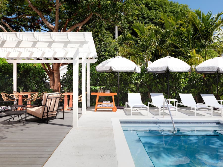 Outdoor pool, open 8:00 AM to 10:00 PM, pool loungers