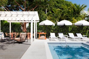 Outdoor pool, open 8:00 AM to 10:00 PM, sun loungers