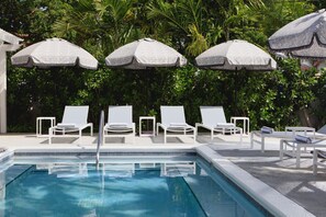 Outdoor pool, open 8:00 AM to 10:00 PM, sun loungers
