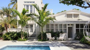 Outdoor pool, open 8:00 AM to 10:00 PM, pool loungers