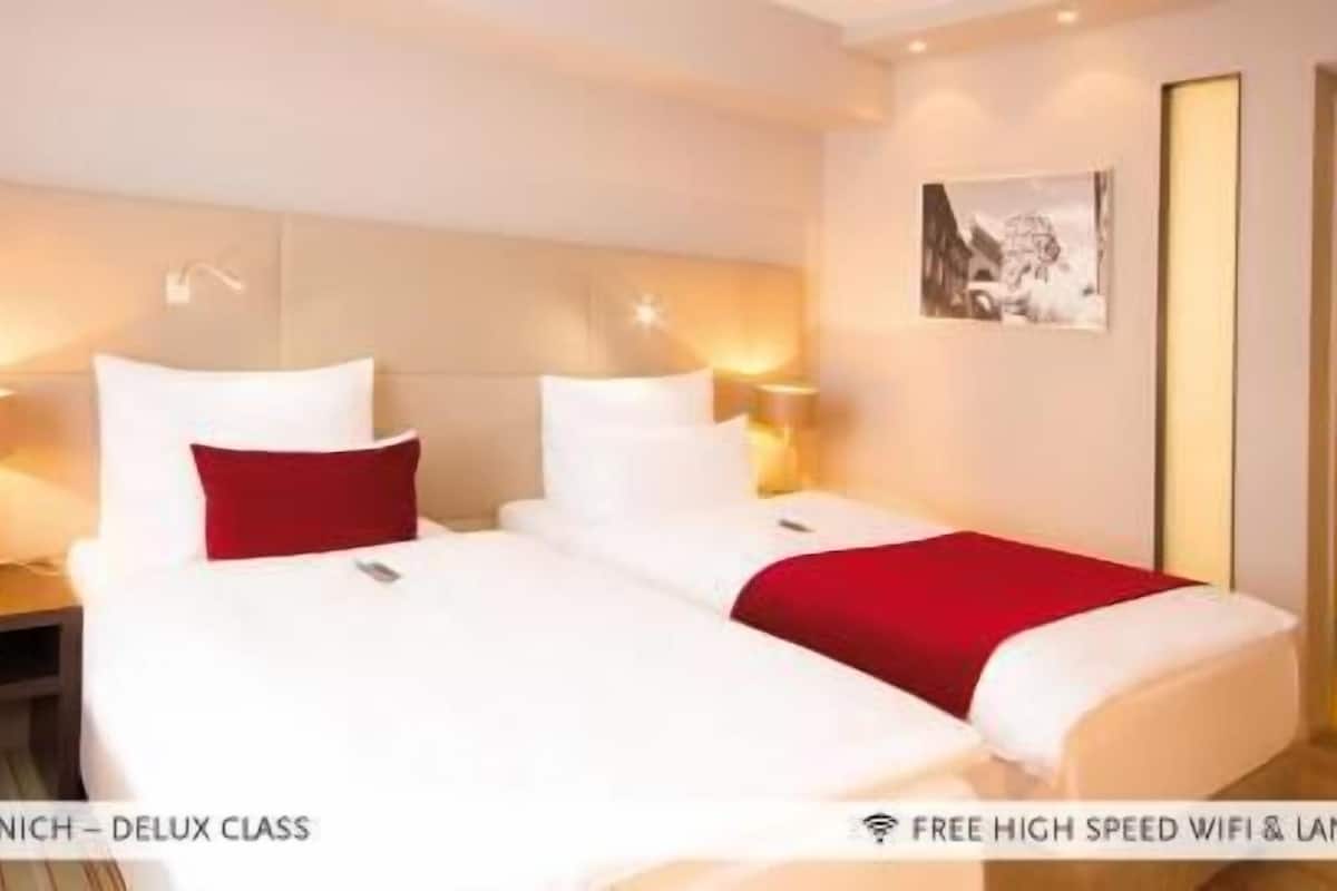 Premium bedding, pillowtop beds, minibar, in-room safe