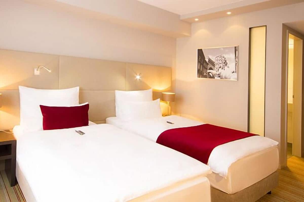 Premium bedding, pillow-top beds, minibar, in-room safe