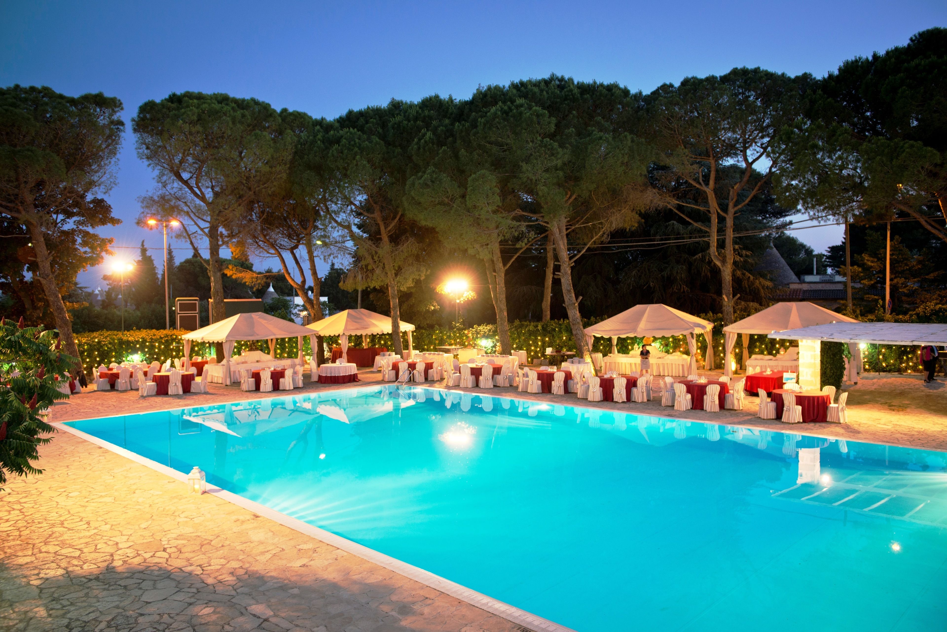 seasonal outdoor pool, pool umbrellas, pool loungers