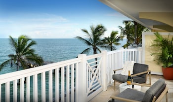 Premium bedding, pillowtop beds, in-room safe, desk at Southernmost Beach Resort