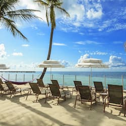 On the beach, sun loungers, beach umbrellas, beach towels