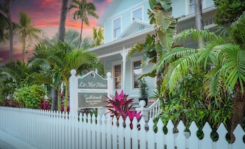 La Mer Dewey Island View King | Premium bedding, pillowtop beds, in-room safe, desk at Southernmost Beach Resort and Guesthouses