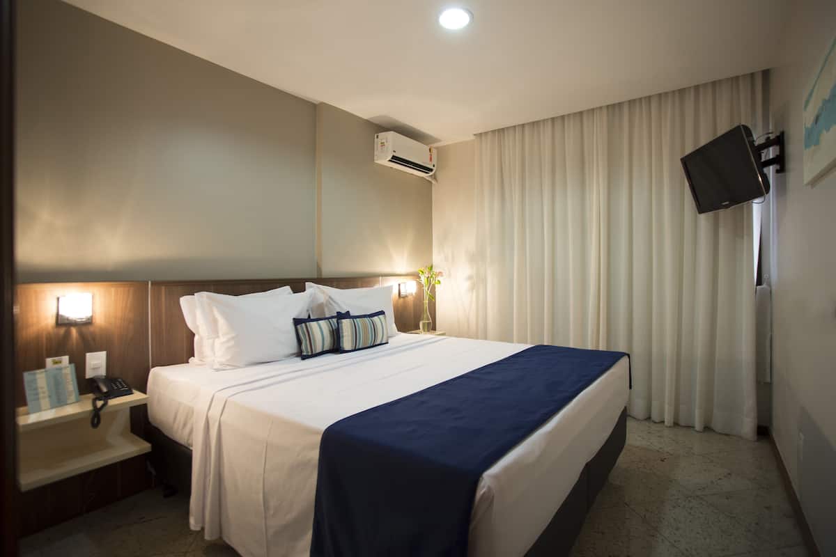 8 habitaciones, minibar y caja de seguridad en la habitación