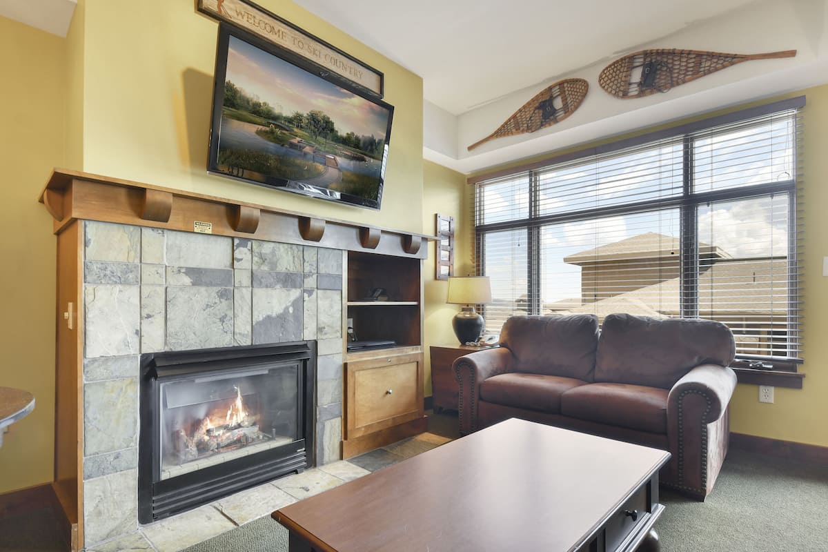 Condo, 2 Bedrooms (Sundial Lodge) | Living area | Flat-screen TV, pay movies