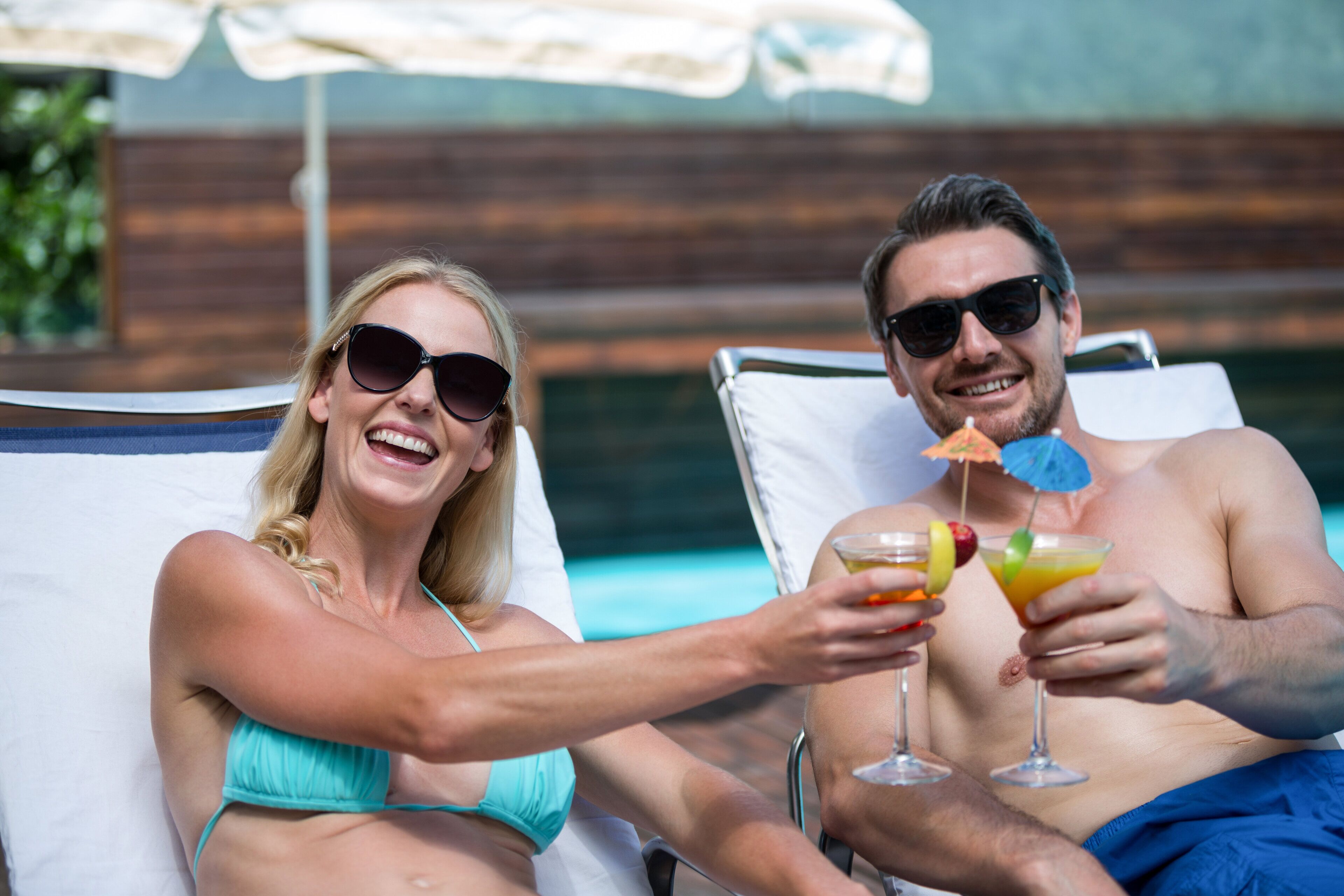 Indoor pool, open 9:00 AM to 10:00 PM, pool umbrellas, pool loungers