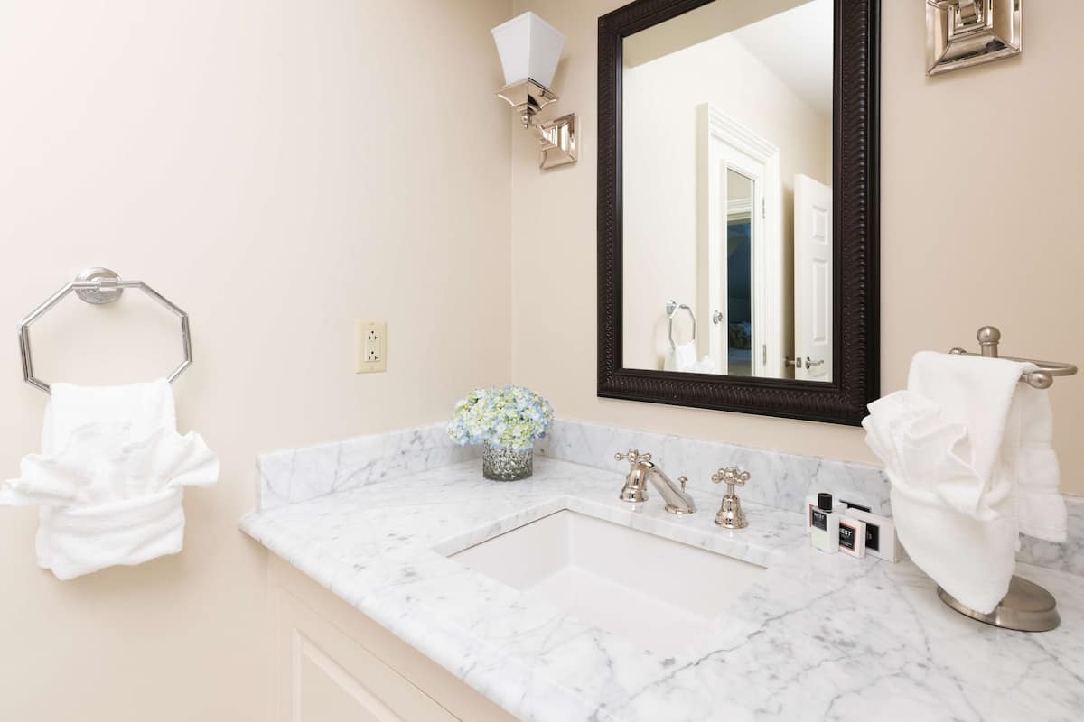 Shower, designer toiletries, hair dryer, bathrobes
