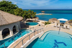 7 outdoor pools, pool loungers - Sandals Montego Bay - ALL INCLUSIVE Couples Only (Montego Bay)