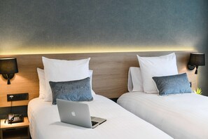Deluxe szoba, 2 egyszemélyes ágy, nemdohányzó | 1 hálószoba, prémium ágynemű, kényelmi párnázat és széf a szobában