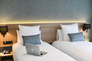 Chambre Deluxe, 2 lits une place, non-fumeurs | Literie de qualité supérieure, surmatelas