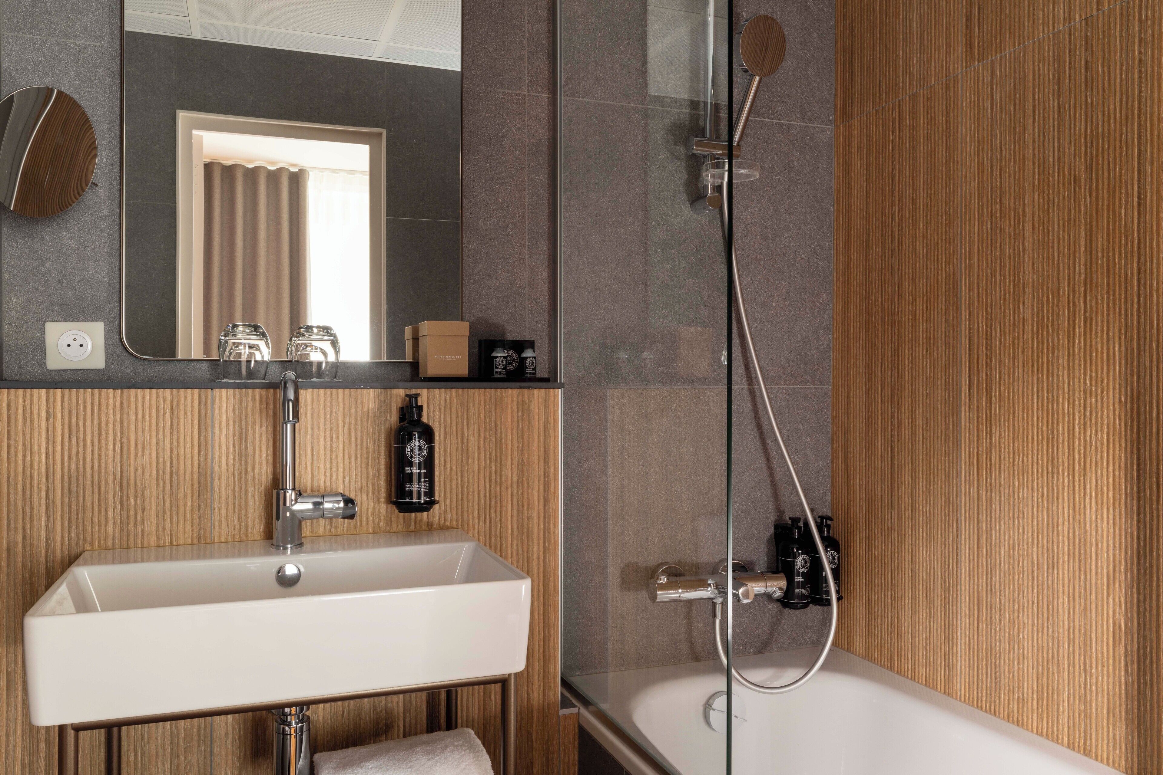 superior double room | bathroom | free toiletries, hair dryer, towels