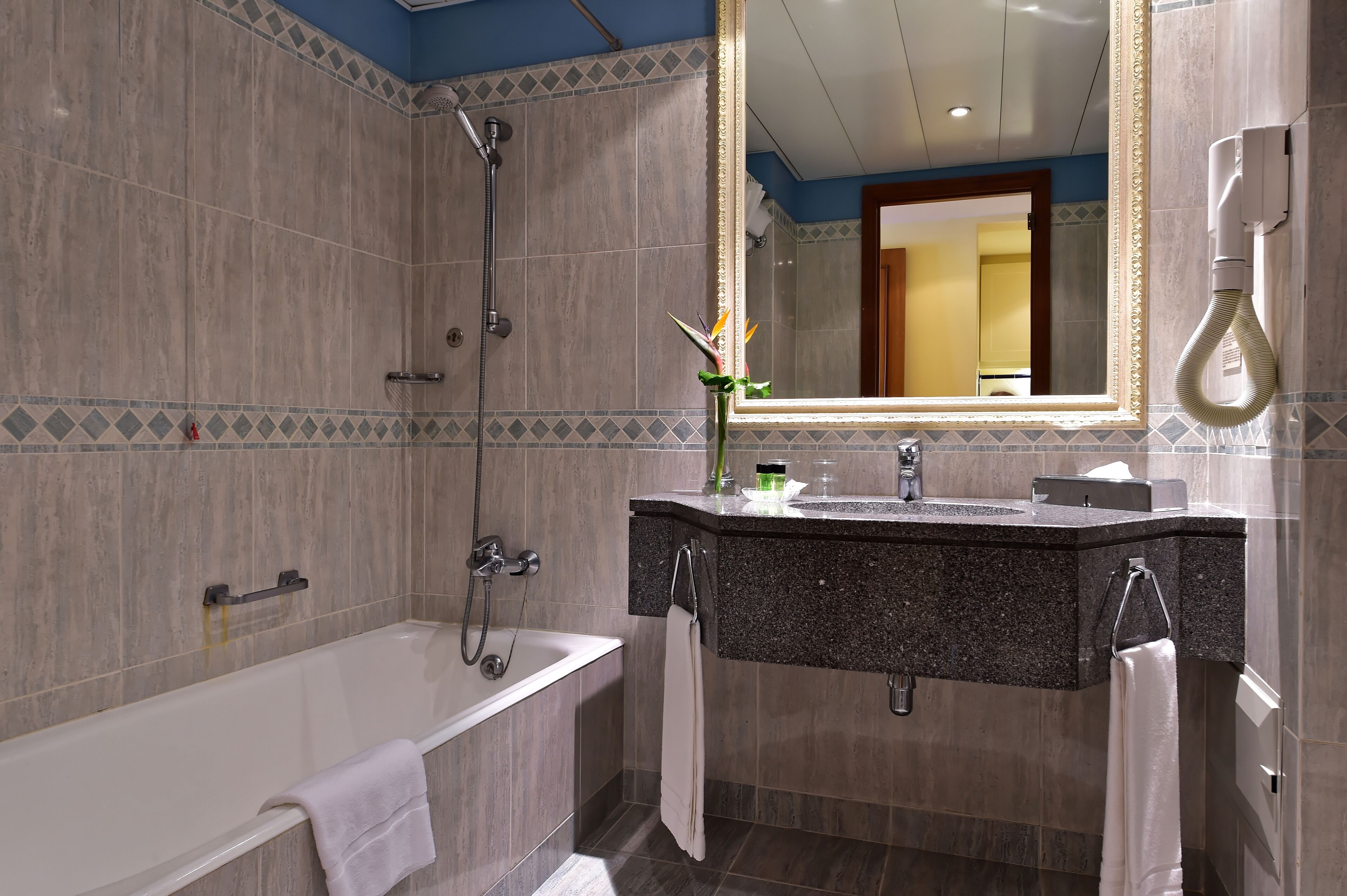 superior studio | bathroom | deep-soaking bathtub, free toiletries, hair dryer, towels